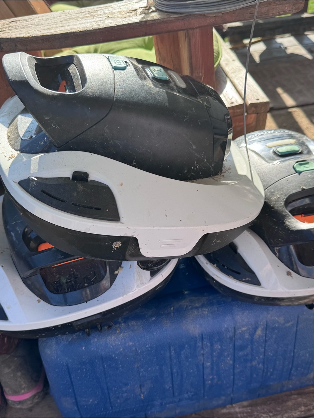 Stack of Black and White Robot Vacuum Bases